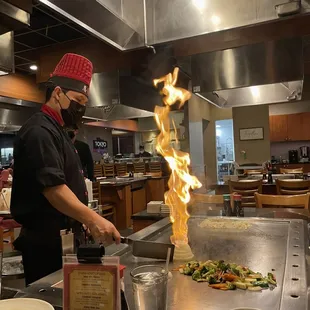 a chef preparing a dish