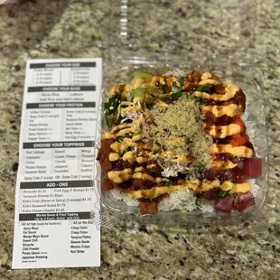 spicy salmon, spicy tuna, and ahi tuna, jalapeño, scallions, snow crab, masago, spicy mayo and eel sauce, and tempura flakes