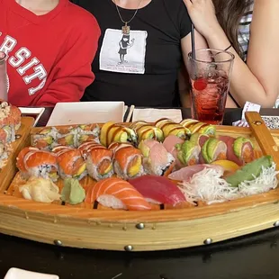 If you order enough sushi it&apos;ll come out on a fun wooden boat!