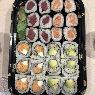 a tray of sushi