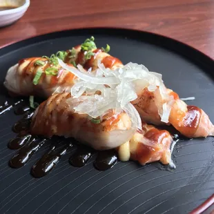 Garlic salmon and garlic hamachi nigiri