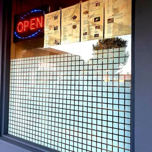 an open sign in a window