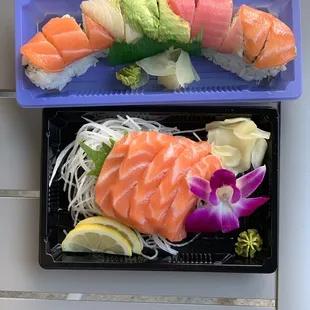 Rainbow roll and 5 piece salmon sashimi.