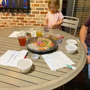 My daughter enjoying her time at Ginzaro at the Dallas Farmers Market