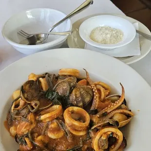 Bìgoli ai Sapori di Golfo: Black squid ink pasta with Frutti di Mare