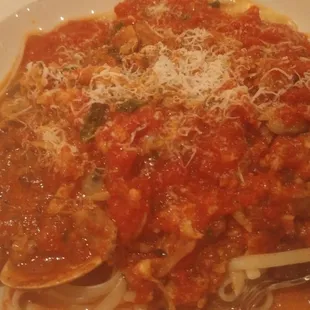 Linguini with baby clams in red sauce