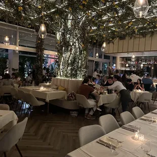 a restaurant with a lot of tables and chairs