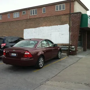 Parking along the side of the building.