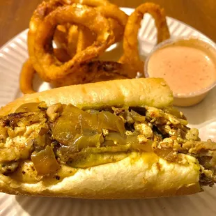 Chicken pesto sandwich and onion rings.  Large portions.  The other half was saved for later.