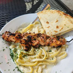 Alfredo with a chicken skewer.