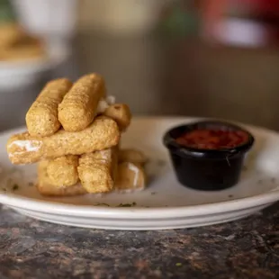 a stack of fried tater tots