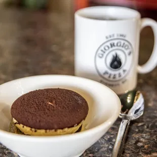 a cup of coffee and a cookie