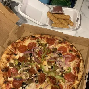 Supreme Pizza and mozzarella sticks