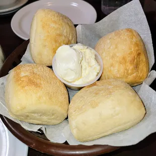 Hot, toasty rolls w/ whipped butter.