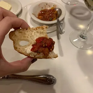 Delicious bread appetizer with heirloom tomato dip. Loved it!