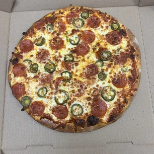 Pepperoni and jalapeño pizza