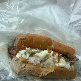 Italian Beef, with hot peppers and mozzarella cheese,  dipped in God&apos;s glory lol