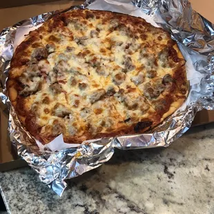 As a Chicago transplant this is legit Chicago style pizza!! Delicious!