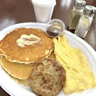 #1 Breakfast Special - Two pancakes, two eggs, and choice of meat (bacon, sausage, chorizo or ham)