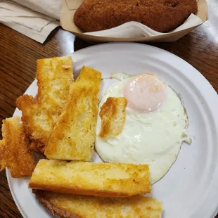 Devil Crab and an over easy egg for the perfect Tampa breakfast.
