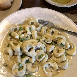 Tortellini al panna - i had them hold the sundried tomatoes and added peas.  The cream sauce is legit.