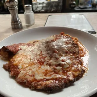 Chicken Parmesan with pasta.