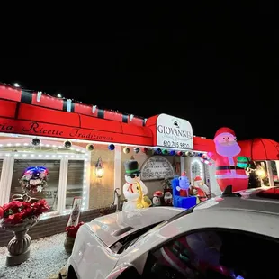 a car parked in front of the restaurant