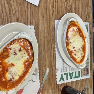One is the ravioli trio, the other a trio with stuffed shell, manicotti &amp; lasagna