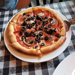 Small Pepperoni and olive pizza