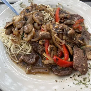 Steak with veggies and pasta