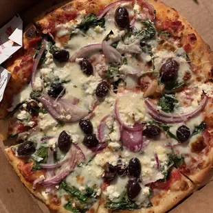 Greek pizza with onions added