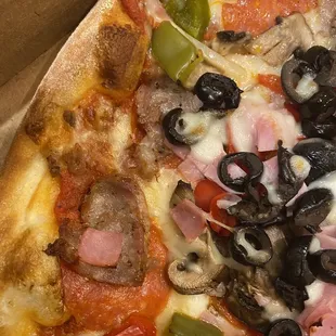 Their greasy, soaked crust olive &quot;special&quot; pizza. Might be a little cheese and sauce in there somewhere.