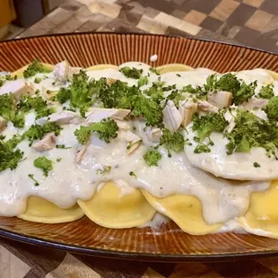 Cheese ravioli with homemade Alfredo Chicken Sauce with chicken and broccoli...