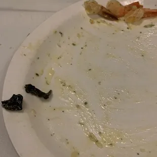Spaghetti Carbonara with what appears to be pieces of lettuce.