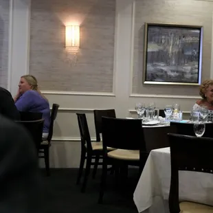 a group of people sitting at a table