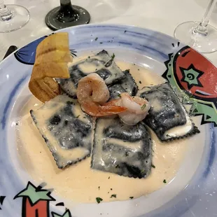 Mezcalina Di Granchio  Half- moon shaped pasta with crab meat served in a lobster creamy sauce top with shrimp   A must try ! Delicious ..