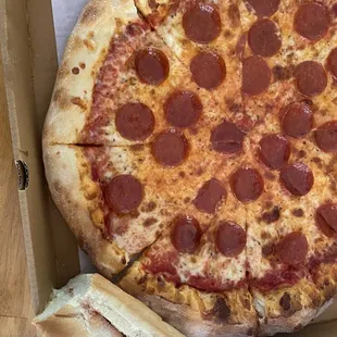 Lg pep pizza and half of the large meatball sub