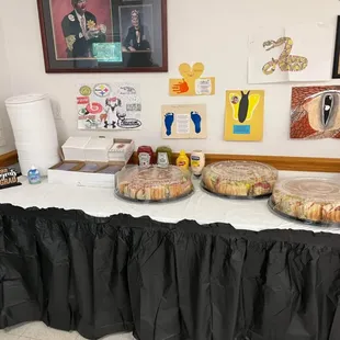 a table with a variety of pastries on it