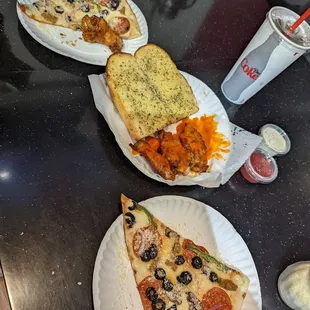 Supreme Pizza with 4 Piece Buffalo Wings Half Garlic Bread and a Medium Drink