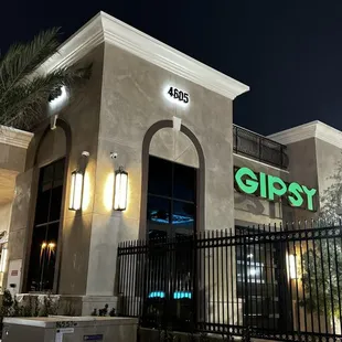 the front of the building at night