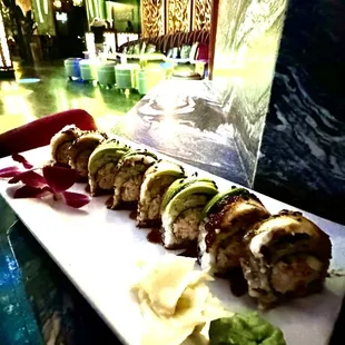 a plate of sushi rolls