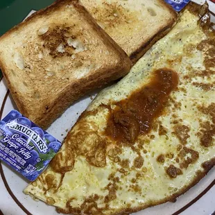 Greek omelet with Texas toast.  Just the right amount of Greek sauce, with a bit of a kick.