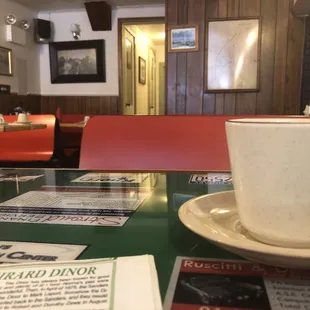 a cup of coffee on a table