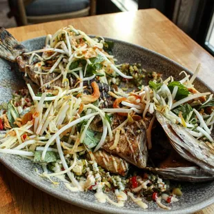 Grilled whole branzino.