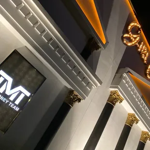 the front of a hotel at night