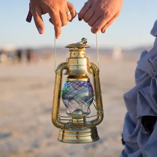 Girl Glass made me a Custom Globe for a Dietz Lantern for a Burning Man Wedding.