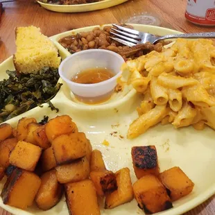 Roasted butternut squash, grilled greens, jalapeno mac and cheese and bbq beans. All were yummy but the greens were great.