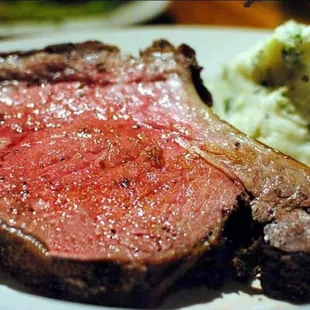 steak and mashed potatoes on a white plate