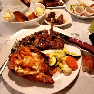 Strip steak, sweet potato, veggies, rolls