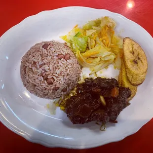 Oxtails and rice and peas